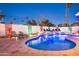 Inviting pool area with deck chairs and elegant lighting features, ideal for relaxation and entertaining at 7020 E Friess Dr, Scottsdale, AZ 85254