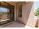 Private outdoor balcony with sliding glass doors and desert views at 7445 E Eagle Crest Dr # 1111, Mesa, AZ 85207