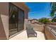 Relaxing outdoor balcony with a lounge chair and views of the surrounding neighborhood at 7445 E Eagle Crest Dr # 1111, Mesa, AZ 85207