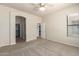 Primary bedroom with lots of space, open doorway, and walk-in closet at 7445 E Eagle Crest Dr # 1111, Mesa, AZ 85207