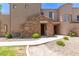 Inviting entryway featuring stone accents and desert landscaping at 7445 E Eagle Crest Dr # 1111, Mesa, AZ 85207