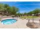 Relaxing hot tub with mosaic tile, set in a beautifully landscaped community with ample green space at 7445 E Eagle Crest Dr # 1111, Mesa, AZ 85207