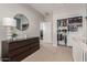 Bright bedroom featuring a closet with ample built-in storage and natural light at 754 E Harper St # 102, Gilbert, AZ 85297