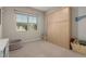 Clean bedroom with an abundance of natural light and a built-in wardrobe at 754 E Harper St # 102, Gilbert, AZ 85297