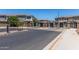 Gated community entrance with decorative brick pillars and secure access for residents and guests at 754 E Harper St # 102, Gilbert, AZ 85297