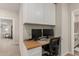 Dedicated office space featuring white cabinets, a butcher block top, and comfortable seating at 754 E Harper St # 102, Gilbert, AZ 85297