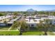 Aerial view of the community showing mature trees and lawns at 8317 E Orange Blossom Ln, Scottsdale, AZ 85250