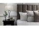 Bright bedroom detail with patterned pillows and stylish nightstand decor at 8317 E Orange Blossom Ln, Scottsdale, AZ 85250