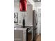 Close up of the kitchen with stainless steel appliances and stone countertops at 8317 E Orange Blossom Ln, Scottsdale, AZ 85250