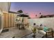A covered patio provides the perfect setting for outdoor gatherings and leisure at 8317 E Orange Blossom Ln, Scottsdale, AZ 85250