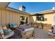 The outdoor patio has dining and seating areas perfect for relaxing and entertaining at 8317 E Orange Blossom Ln, Scottsdale, AZ 85250