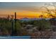 Breathtaking sunset view overlooking the desert landscape with mountains in the distance at 9045 E Chino Dr, Scottsdale, AZ 85255