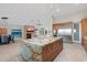 Bright, open kitchen with a large island, stainless appliances, and seamless flow to the living and dining areas at 9045 E Chino Dr, Scottsdale, AZ 85255