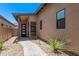 Inviting pathway leading to the front door framed by desert landscaping at 939 E Paseo Way, Phoenix, AZ 85042