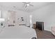 Spacious main bedroom with hardwood floors leading to the main bathroom and closet at 939 E Paseo Way, Phoenix, AZ 85042