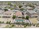Aerial view of a backyard pool area with lush desert landscaping providing privacy and a refreshing escape at 9722 S 45Th Ave, Laveen, AZ 85339