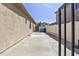 A private backyard featuring a block wall fence and a view of nearby homes at 9722 S 45Th Ave, Laveen, AZ 85339