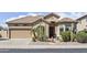 Attractive single-Gathering home with desert landscaping, a water fountain and a two-car garage at 9722 S 45Th Ave, Laveen, AZ 85339