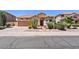 Charming single-story home with desert landscaping and a two-car garage at 9722 S 45Th Ave, Laveen, AZ 85339