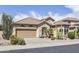Lovely single-Gathering home with a two-car garage, desert landscaping and a charming, welcoming entrance at 9722 S 45Th Ave, Laveen, AZ 85339