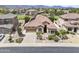 Beautiful single-Gathering home featuring desert landscaping, a fountain, and a neutral color palette at 9722 S 45Th Ave, Laveen, AZ 85339