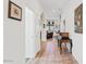 Inviting hallway with tile flooring and decorative accents leading into living areas at 9722 S 45Th Ave, Laveen, AZ 85339