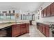 Functional kitchen featuring dark cabinets and a large sink at 9722 S 45Th Ave, Laveen, AZ 85339