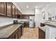 Well-equipped kitchen featuring stainless steel appliances, ample counter space, and tile flooring at 9722 S 45Th Ave, Laveen, AZ 85339