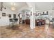 Open-concept living room featuring tile floors and views of the outdoors at 9722 S 45Th Ave, Laveen, AZ 85339