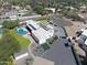 Expansive property featuring a pool, solar panels, landscaped grounds, and a large yard with an outdoor building at 10024 N 61St Pl, Paradise Valley, AZ 85253