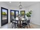 Charming dining area with views of the pool and outdoor entertaining space at 10024 N 61St Pl, Paradise Valley, AZ 85253