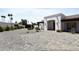 Well-maintained home with paver driveway, desert landscaping, and ample parking space at 10024 N 61St Pl, Paradise Valley, AZ 85253