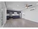 Open-concept kitchen features navy cabinets, stainless steel appliances, and lots of light at 10024 N 61St Pl, Paradise Valley, AZ 85253
