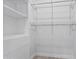 Spacious walk-in closet with built-in shelving and ample storage options at 10024 N 61St Pl, Paradise Valley, AZ 85253
