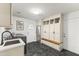 Mudroom with washer, dryer, fridge, and storage cabinets at 1018 W State Ave, Phoenix, AZ 85012
