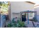 Spacious backyard with covered patio, grill, and raised garden beds, perfect for outdoor living at 10225 W Camelback Rd # 45, Phoenix, AZ 85037