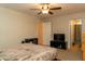 Bedroom with neutral walls leading to the bathroom, providing a serene retreat at 10225 W Camelback Rd # 45, Phoenix, AZ 85037