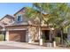 Charming two-story home features a two car garage, landscaped front yard and a tile roof at 10225 W Camelback Rd # 45, Phoenix, AZ 85037