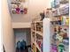 Walk-in pantry with adjustable shelving provides ample storage for food and household items at 10225 W Camelback Rd # 45, Phoenix, AZ 85037