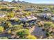 Expansive desert property with private pool, outdoor living spaces, and mountain views at 10664 E Monument Dr, Scottsdale, AZ 85262