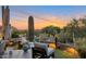 Relax on the outdoor patio while enjoying the desert landscape at sunset at 10664 E Monument Dr, Scottsdale, AZ 85262