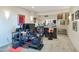 Finished basement with bar area, entertainment setup, carpet flooring and custom lighting at 10664 E Monument Dr, Scottsdale, AZ 85262