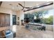 Bright home office featuring a large window with desert views and modern decor at 10664 E Monument Dr, Scottsdale, AZ 85262