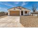 Charming single-story home featuring a low-maintenance yard and attached two-car garage at 11474 N 79Th Dr, Peoria, AZ 85345