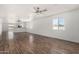Spacious living room with hardwood floors, neutral walls, and bright natural light at 11474 N 79Th Dr, Peoria, AZ 85345
