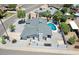 A serene backyard oasis featuring a sparkling pool and well-maintained desert landscaping at 13215 N 30Th Pl, Phoenix, AZ 85032
