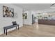 Cozy living space with decor, flowing into the beautifully renovated kitchen and offering comfortable seating at 13215 N 30Th Pl, Phoenix, AZ 85032
