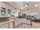 Well-equipped kitchen with stainless steel appliances, granite countertops, and tiled flooring at 1423 E 1St St, Mesa, AZ 85203