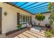 Cozy outdoor patio area with brick pavers, a pergola, and comfortable seating at 1423 E 1St St, Mesa, AZ 85203