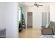 Bright bedroom with natural light, cozy seating, and ample closet space at 15148 W Sells Dr, Goodyear, AZ 85395